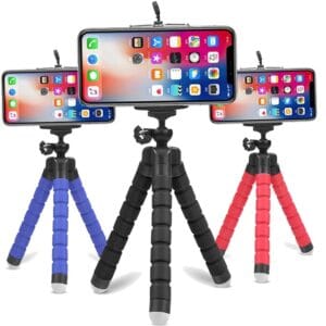 Mini Trépied Flexible photo gorillapod enroulé autour d'une branche, idéal pour la photographie en extérieur.