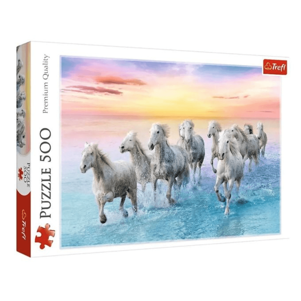 Puzzle Trefl 500 pièces Puzzle Trefl 500 pièces représentant des chevaux blancs au galop dans la mer au coucher du soleil. La boîte est blanche avec l'image sur le devant et la mention 'PUZZLE 500 Premium Quality' sur le côté.