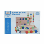 Jeu d'enfilage en bois Sugar Gourd dans sa boîte d'origine Wood Mom - Disponible au Maroc.