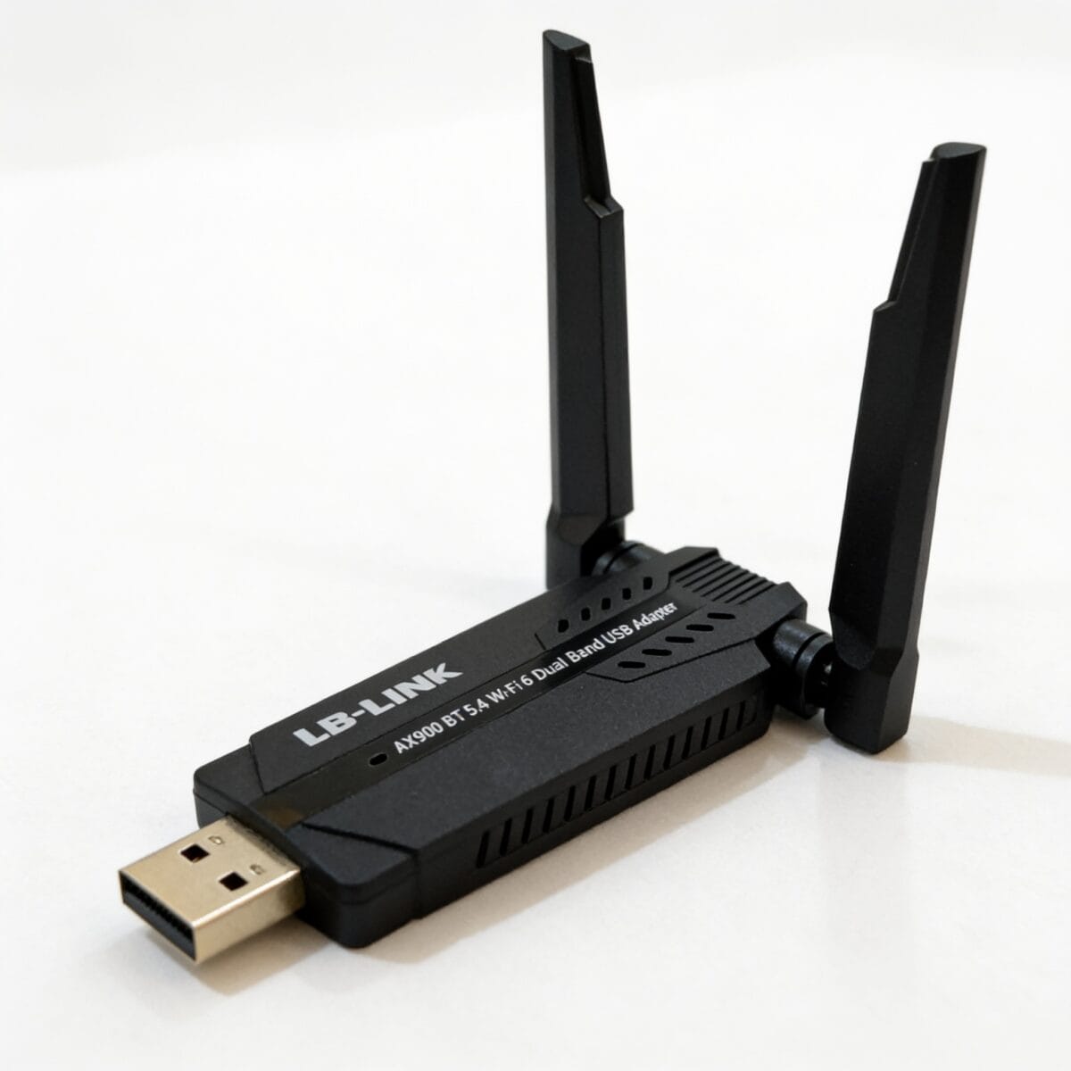 adaptateur wifi bluetooth usb double bande 2,4 GHz + 5 GHz 286,8 Mbps + 600 Mbps avec Bluetooth 5.4 pour connecter un ordinateur à un réseau Wi-Fi 6 via USB, disponible sur BrefShop.ma