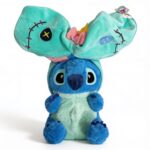 peluche bleue alien enfant avec capuche et oreilles intégrées, jouet Stitch, disponible sur BrefShop.ma