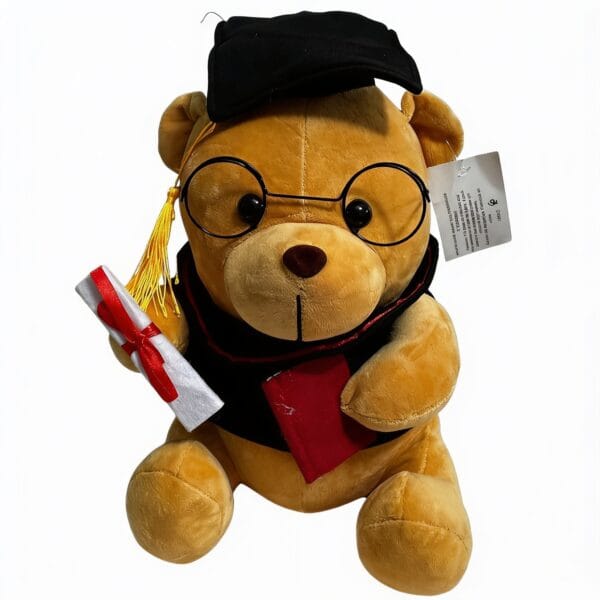 peluche ours diplômé avec chapeau de diplômé noir à gland jaune, lunettes rondes noires et écharpe noire et rouge, cadeau de remise de diplôme, disponible sur BrefShop.ma